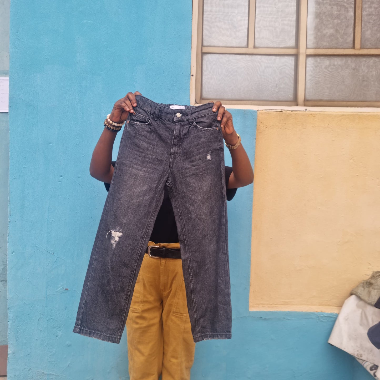 9_years_old_ripped_denim_trousers_by_Zara