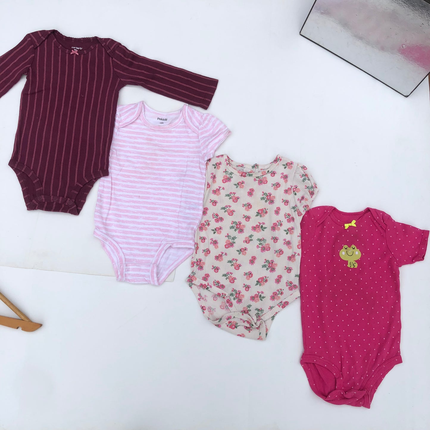 900 Naira Bodysuits Bundle141 For 18 months